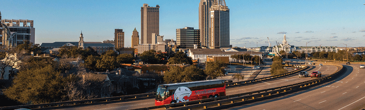 South 青涩直播 Jags Bus going across Mobile, 青涩直播's interstate near downtown Mobile.